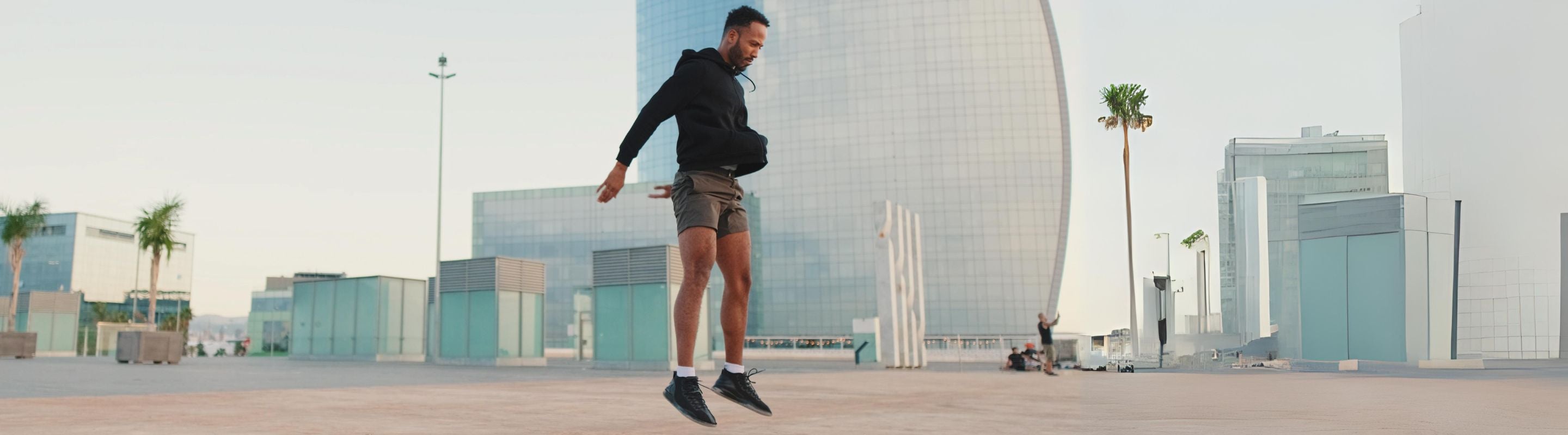 Man doing jump squats