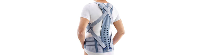 Woman wearing the Spinova Osteo Back Brace