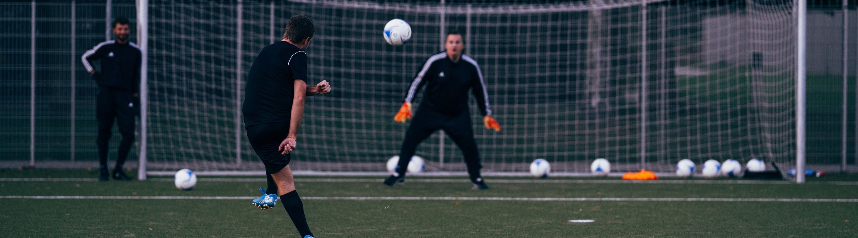 men playing football on a field. 