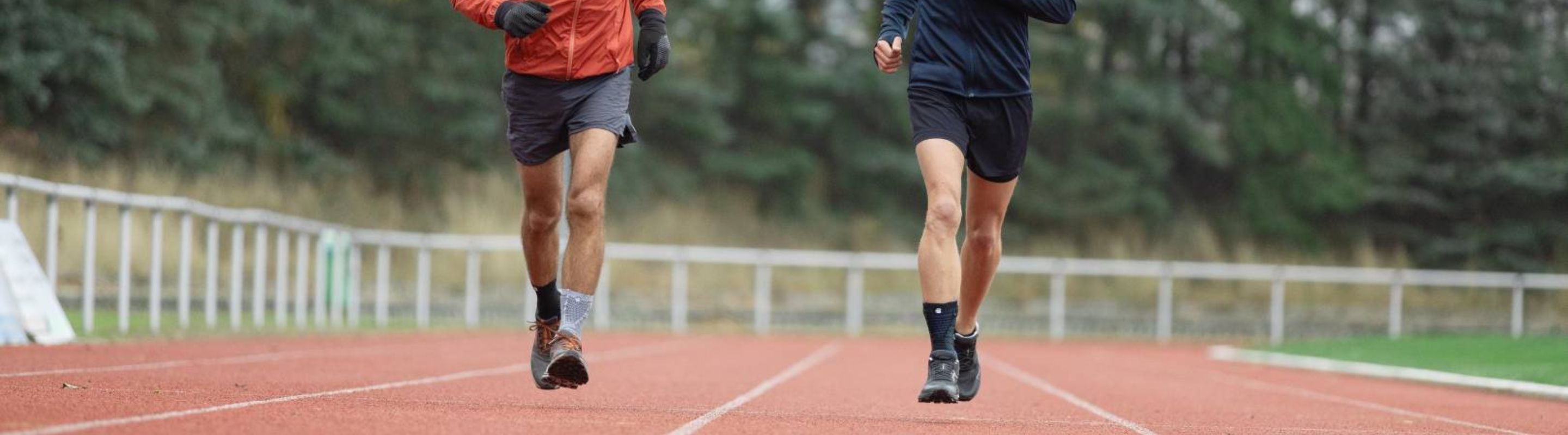 Men running in ankle braces to help them recover from ankle injury