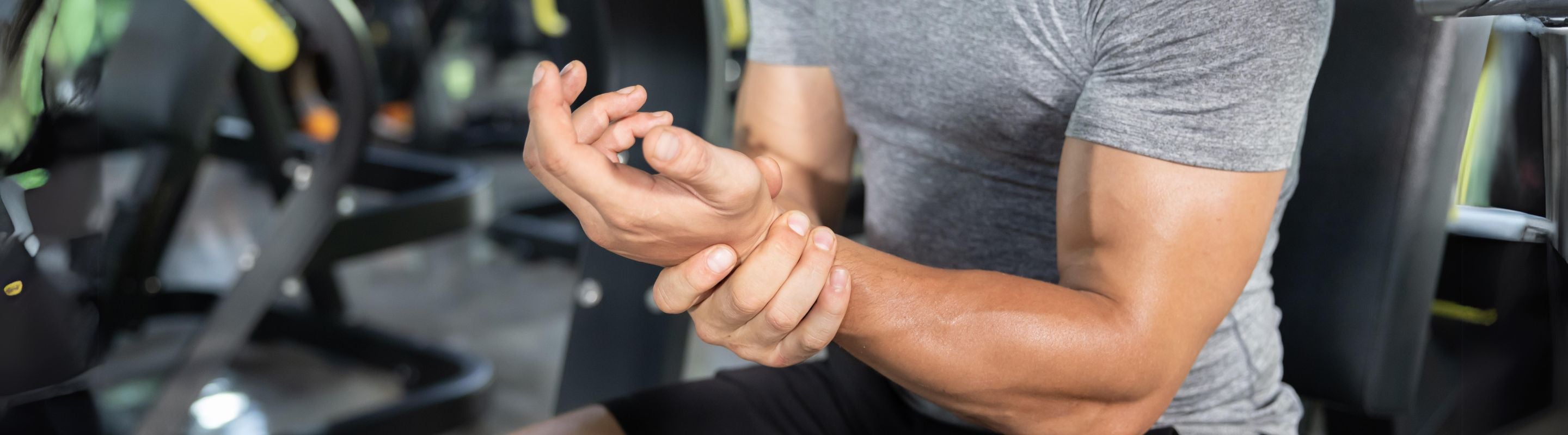 Man at the gym with a wrist injury