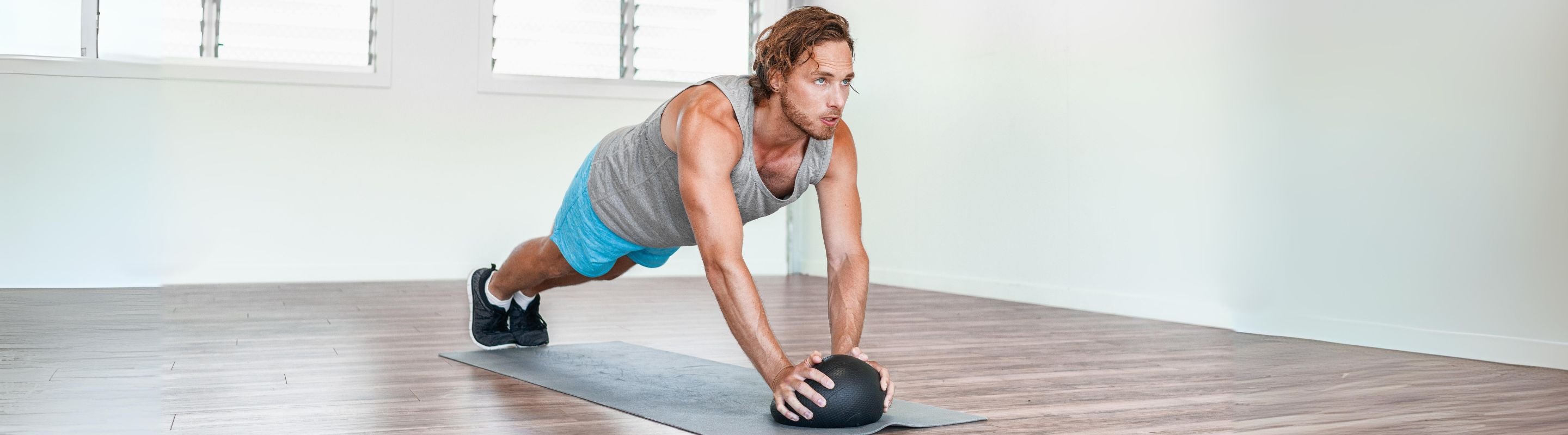 Man performing stability ball push-ups