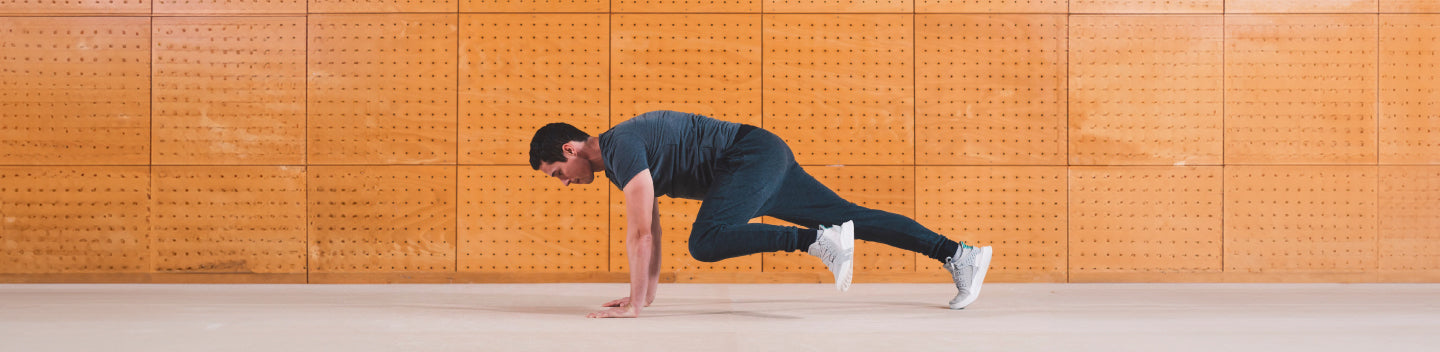 Man doing the Spider Mountain Climbers exercise