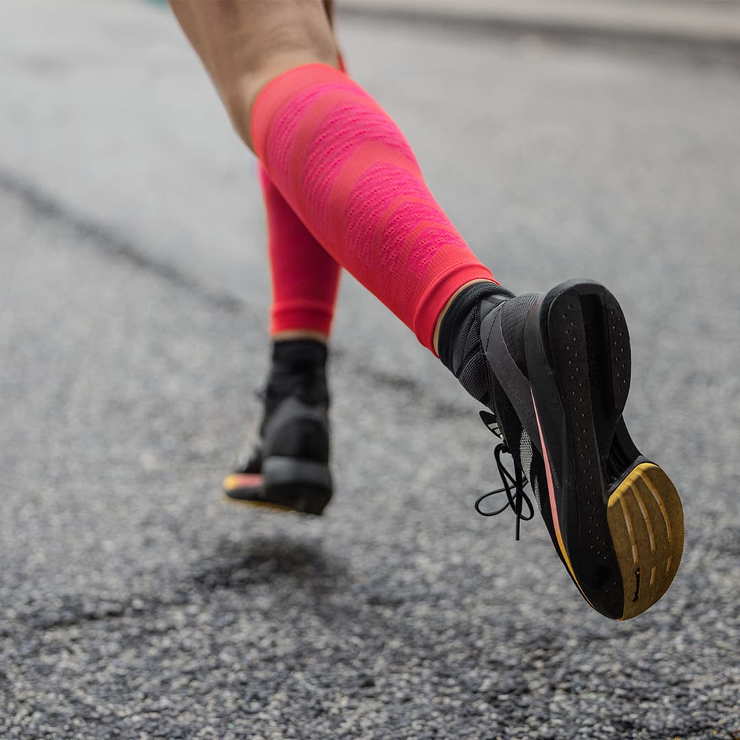 a girl wearing Bauerfeind compression calf sleeves