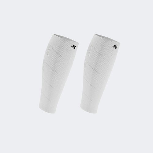 Pair of white Bauerfeind compression calf sleeves on a white background