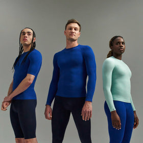 Three people wearing Bauerfeind Compression wear against a gray background